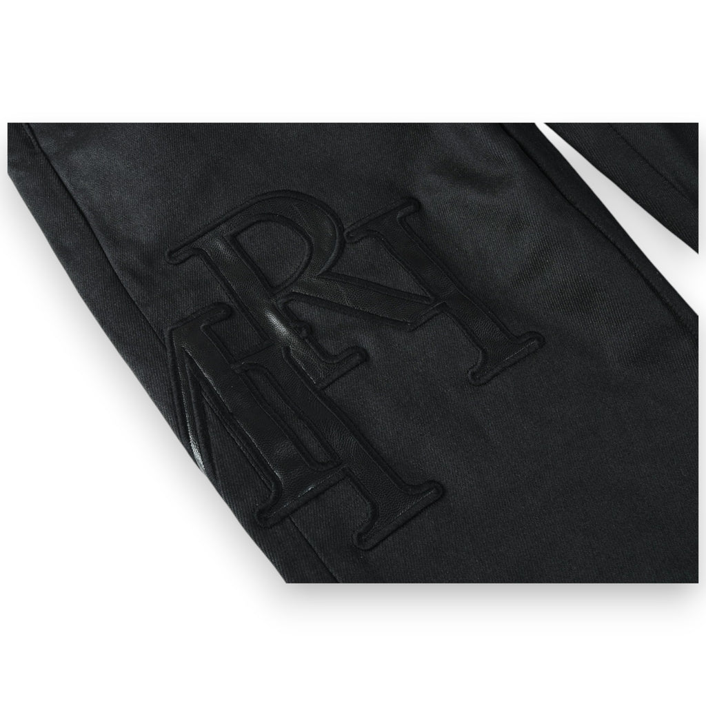 AMIRI WAXED STAGGERED LOGO SKINNY JEAN