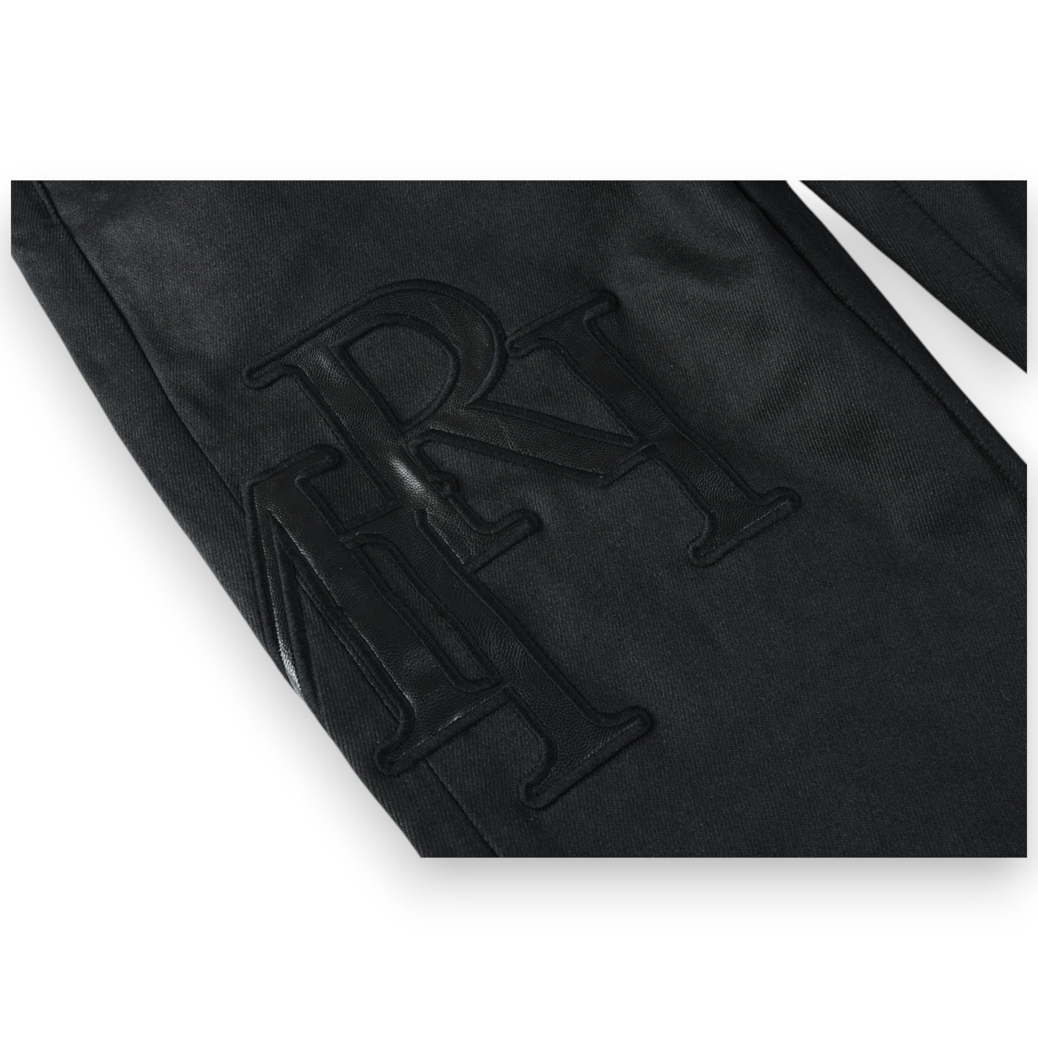 AMIRI WAXED STAGGERED LOGO SKINNY JEAN