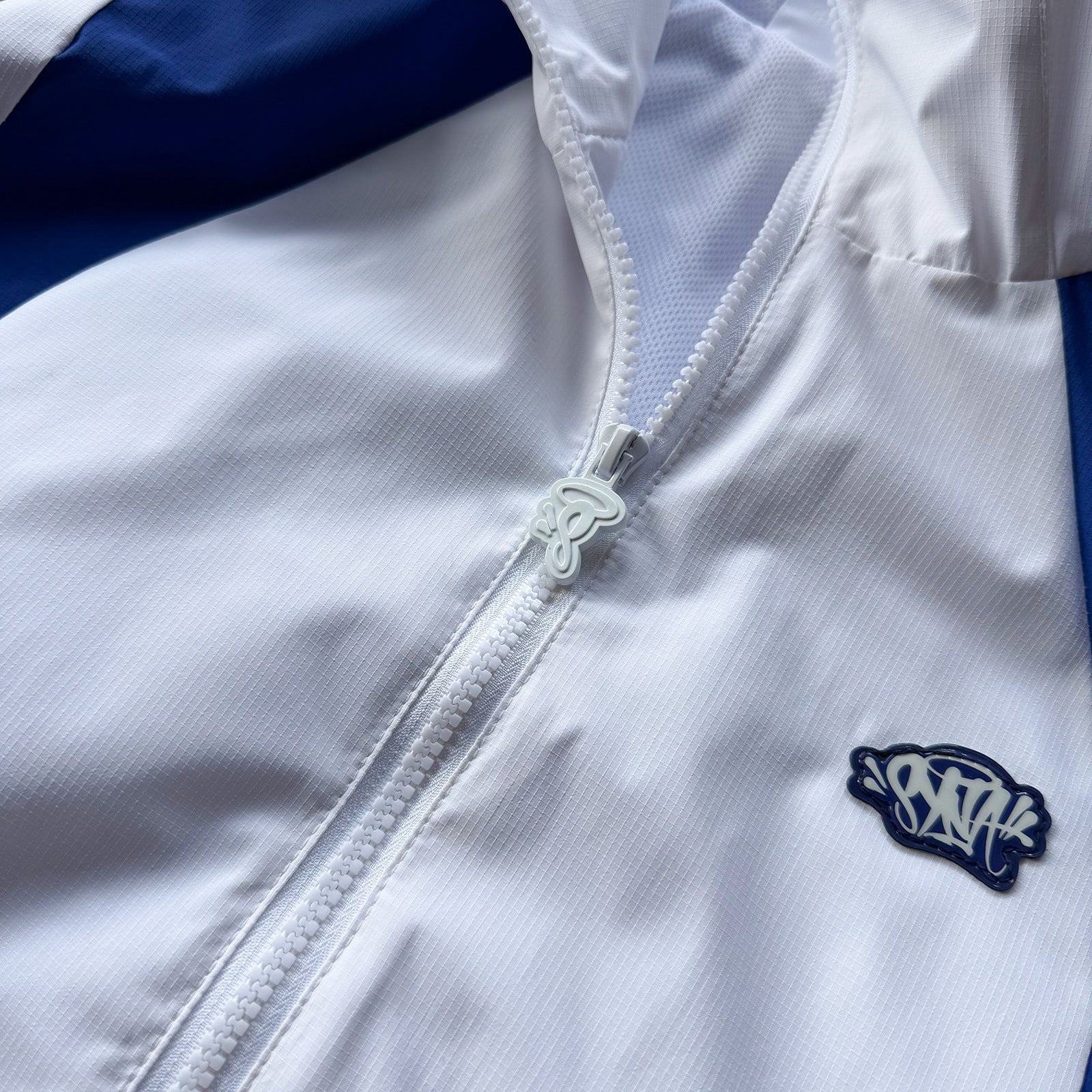 SYNA WORLD VORTEX WOVEN TRACKSUIT